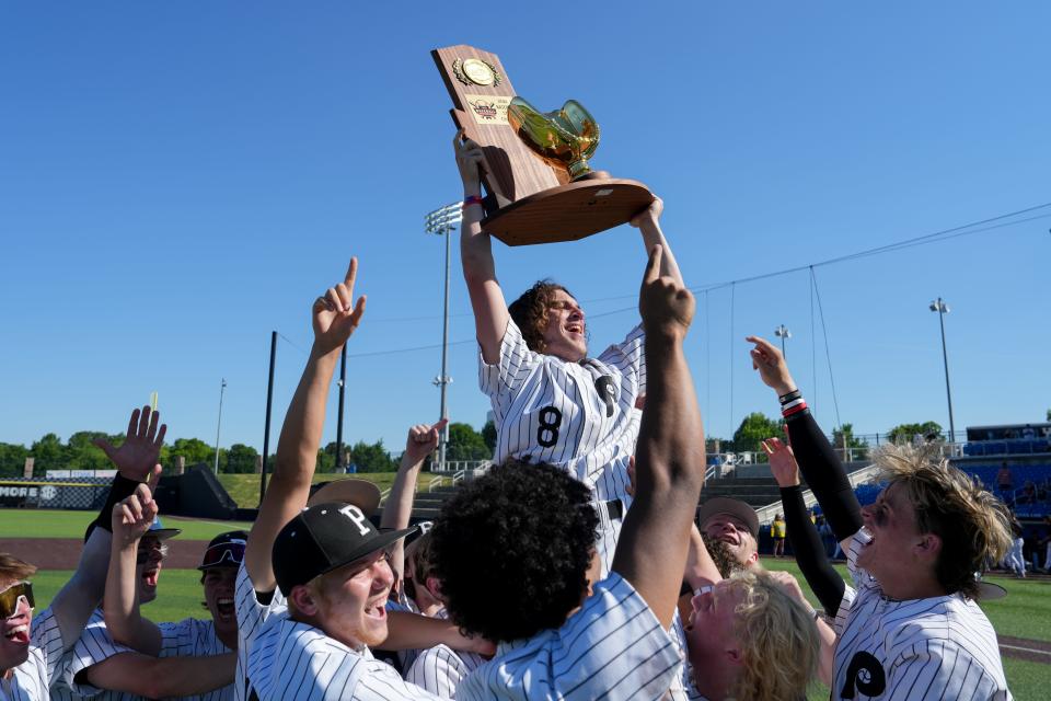 Pleasure Ridge Park celebrates its 4-1 win over McCracken County on Saturday in Lexington for the state baseball championship.