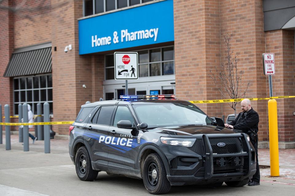 Police investigate the scene where a driver crashed an SUV into Walmart on Ford Road in Canton on Friday, March 1, 2024.
