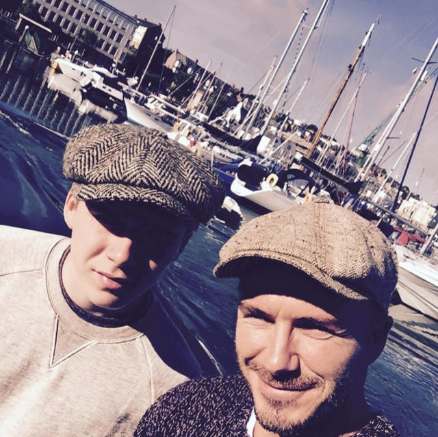 Brooklyn And David Beckham Don Matching Flat Caps For Father And Son Fishing  Session