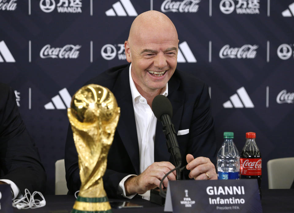 FIFA President Gianni Infantino answers questions during a 2026 soccer World Cup news conference Thursday, June 16, 2022, in New York. (AP Photo/Noah K. Murray)