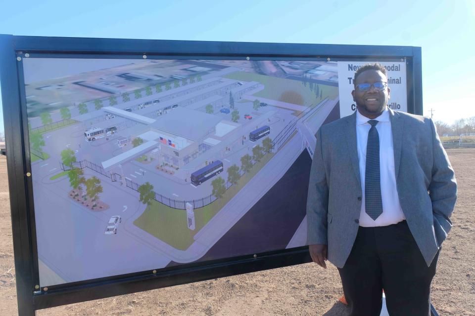 Chris Quigly, the Amarillo transit director stands with an artists' rendition Thursday of the new multimodal transit station tentatively scheduled for completion by December 2023 near downtown Amarillo.