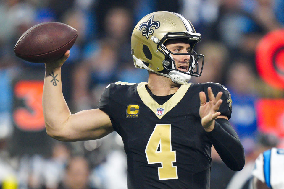 New Orleans Saints quarterback Derek Carr passes against the Carolina Panthers during the first half of an NFL football game Monday, Sept. 18, 2023, in Charlotte, N.C. (AP Photo/Jacob Kupferman)