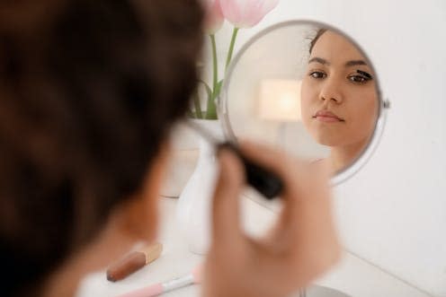   <span class="attribution"><a class="link " href="https://www.shutterstock.com/image-photo/beautiful-africanamerican-woman-applying-makeup-morning-1135025831" rel="nofollow noopener" target="_blank" data-ylk="slk:Pixel-Shot/Shutterstock;elm:context_link;itc:0;sec:content-canvas">Pixel-Shot/Shutterstock</a></span>