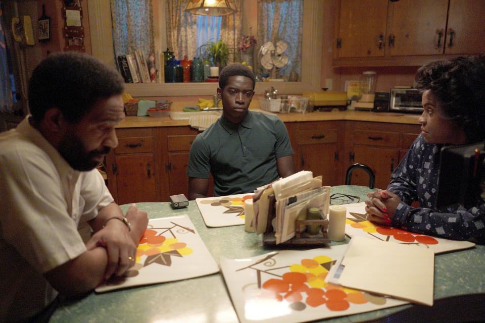 This image released by FX shows, from left, Kevin Carroll as Alton, Damson Idris as Franklin Saint, and Michael Hyatt as Cissy Saint in a scene from "Snowfall." Season four premiers on FX on Wednesday, and Thursday on FX on Hulu. (Byron Cohen/FX via AP)