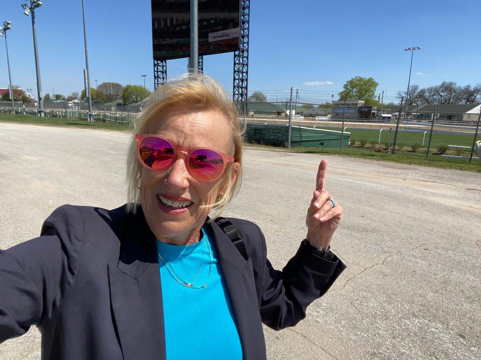 The Courier Journal's Kirby Adams points to a bunker used the weekend of the Kentucky Derby to house the "overserved" until they sober up in the Infield at Churchill Downs.