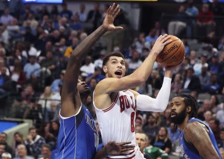 Oct 22, 2018; Dallas, TX, USA; Chicago Bulls guard Zach LaVine (8) looks to shoot as Dallas Mavericks forward Dorian Finney-Smith (10) defends during the first half at American Airlines Center. Mandatory Credit: Kevin Jairaj-USA TODAY Sports