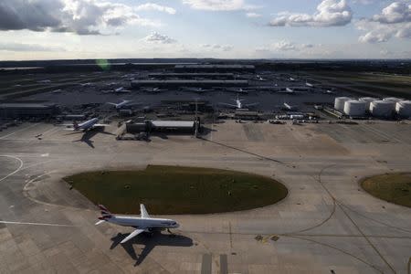 A British Airways aircraft taxis at Heathrow Airport near London, Britain October 11, 2016. REUTERS/Stefan Wermuth