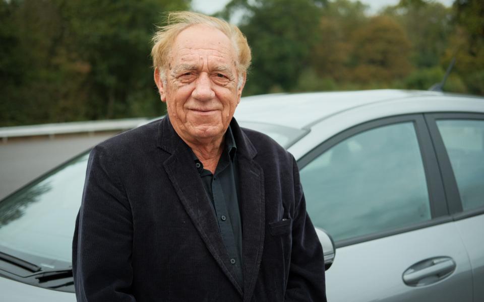 Rob Wilson poses in front of a Ford Puma