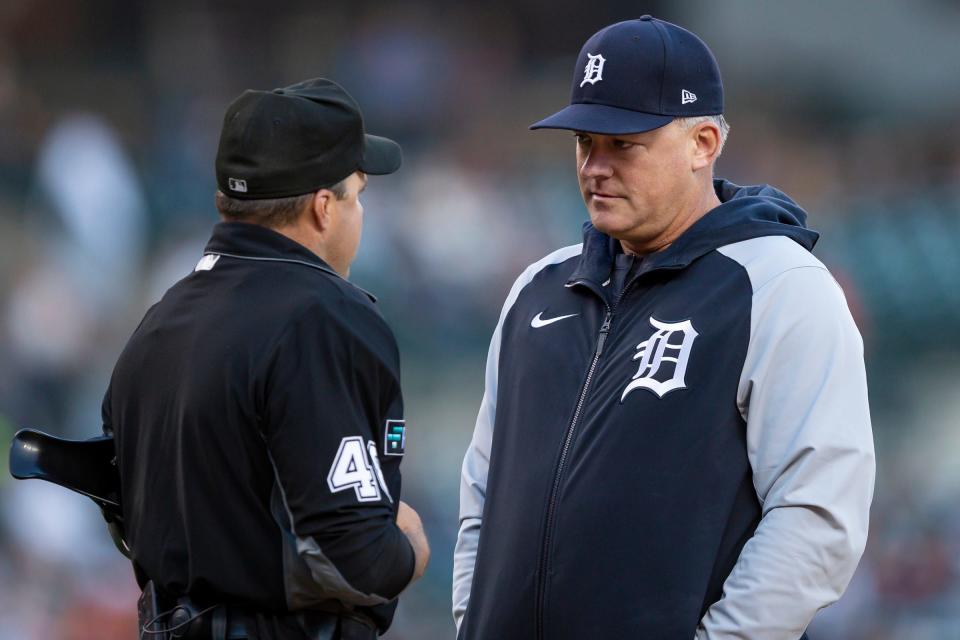 Tigers manager A.J. Hinch talks with umpire Nick Mahrley during the third inning on Monday, May 9, 2022, at Comerica Park.