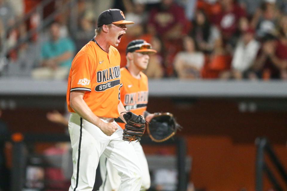 Justin Campbell celebrates after striking out a batter during a NCAA regional championship game between Oklahoma State and Arkansas on June 6. The Simi Valley High graduate could be selected in the MLB draft on Sunday.