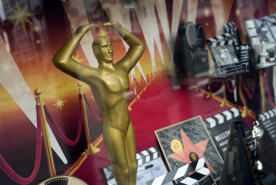 A souvenir Oscar statue is pictured in the window of a Hollywood souvenir shop on Wednesday, March 6, 2024, in Los Angeles. The 96th Academy Awards will be held Sunday at the Dolby Theatre in Los Angeles. (AP Photo/Chris Pizzello)