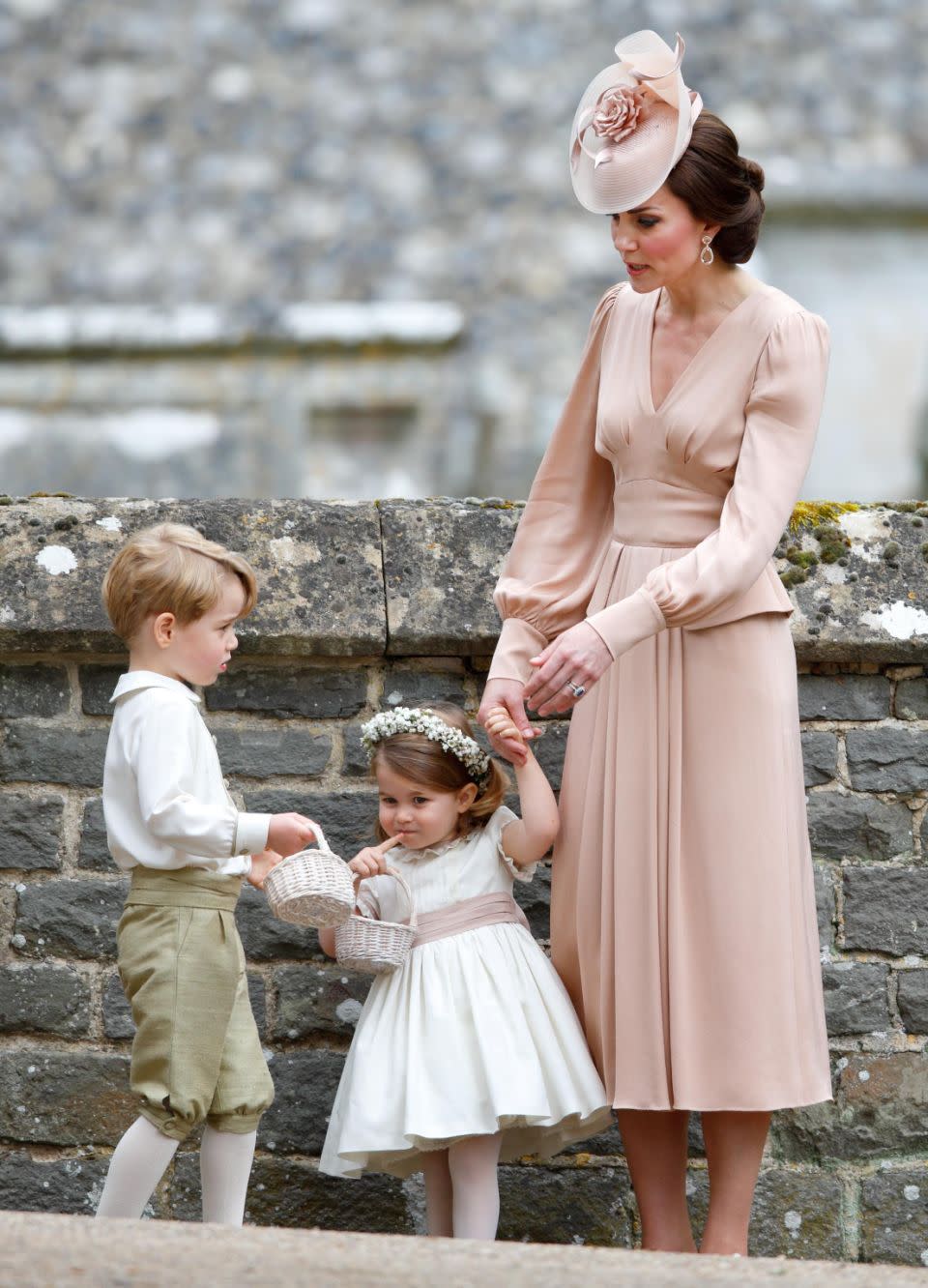 Prince George and Princess Charlotte will play a part in the royal wedding next year. Here they are pictured at Pippa Middleton's wedding in May. Photo: Getty Images