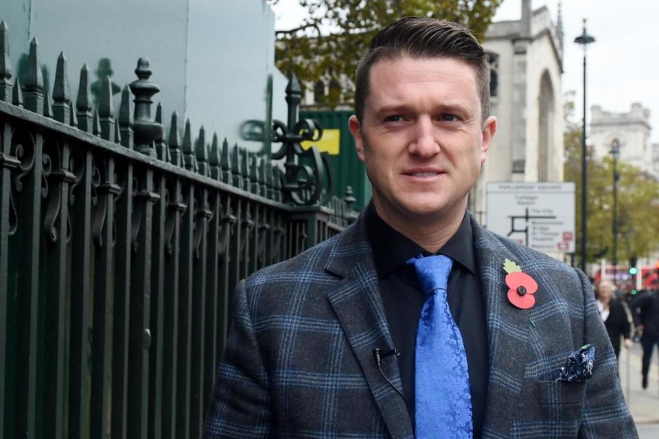 Mr Robinson outside the Houses of Parliament (EPA)