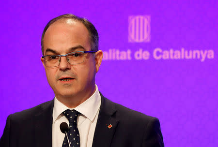 FILE PHOTO: Catalan Government Presidency Councillor Jordi Turull speaks during a news conference after a cabinet meeting at the regional government headquarters in Barcelona, Spain October 17, 2017. REUTERS/Gonzalo Fuentes/File photo