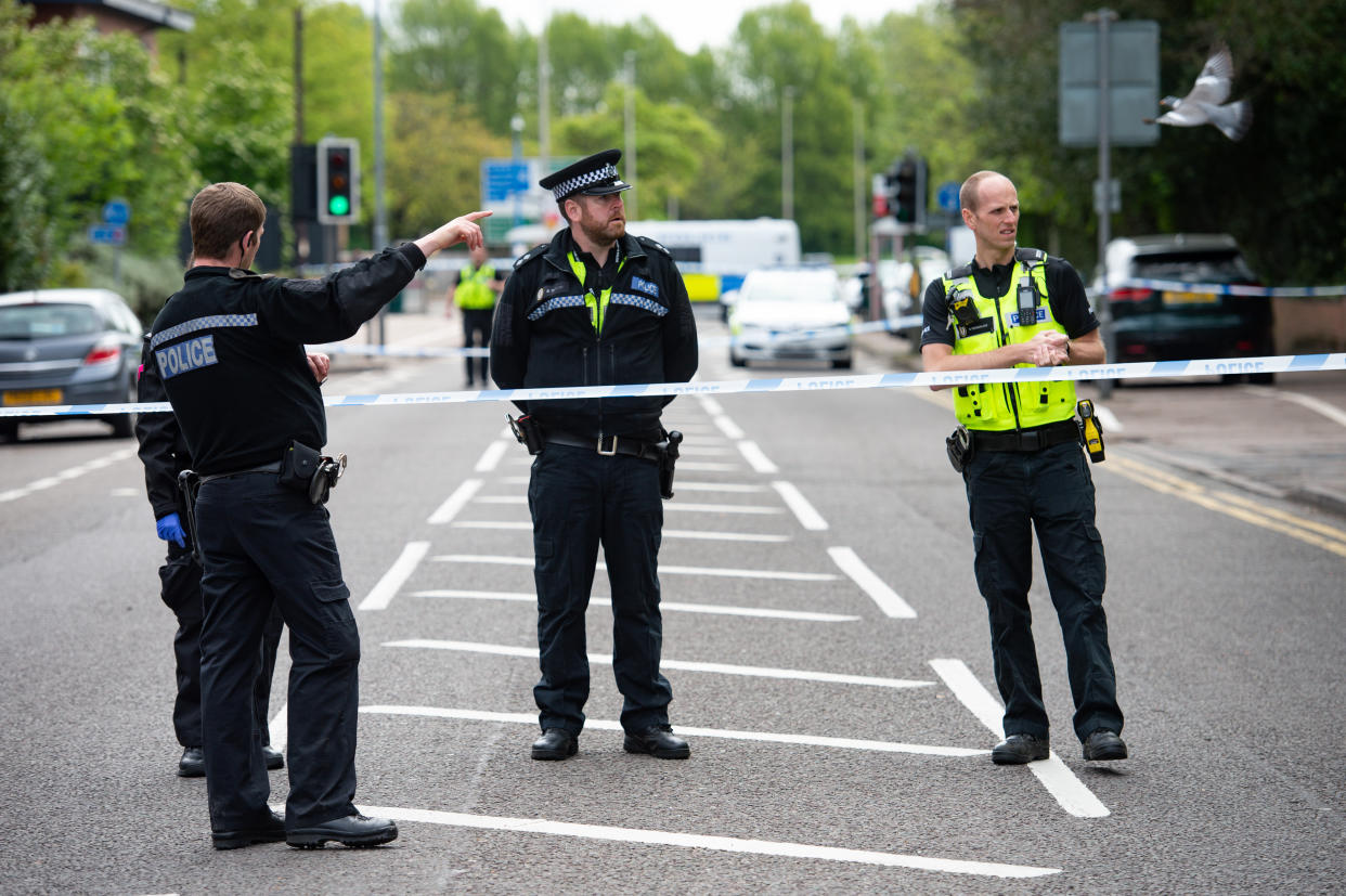 Police man a cordon near a property in Birmingham Road, West Bromwich, where a 53-year-old man has barricaded himself inside after West Midlands Police were called to reports of firearms on Sunday evening. (Photo by Jacob King/PA Images via Getty Images)