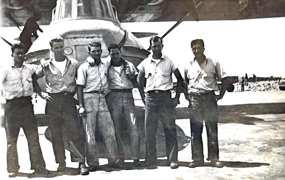 Navy veteran Joseph Jennings, who turned 100 in September, poses with crew mate from his PBY 5A Catalina seaplane.