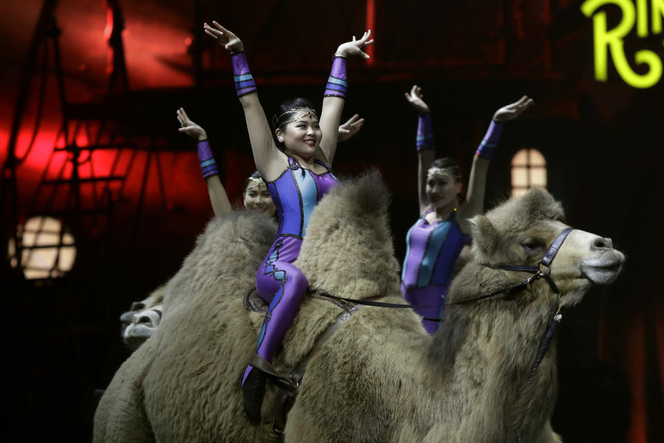 <p> Ringling Bros. and Barnum & Bailey acrobats ride camels during a performance Saturday, Jan. 14, 2017, in Orlando, Fla. The Ringling Bros. and Barnum & Bailey Circus will end the "The Greatest Show on Earth" in May, following a 146-year run of performances. Kenneth Feld, the chairman and CEO of Feld Entertainment, which owns the circus, told The Associated Press, declining attendance combined with high operating costs are among the reasons for closing. (AP Photo/Chris O'Meara) </p>