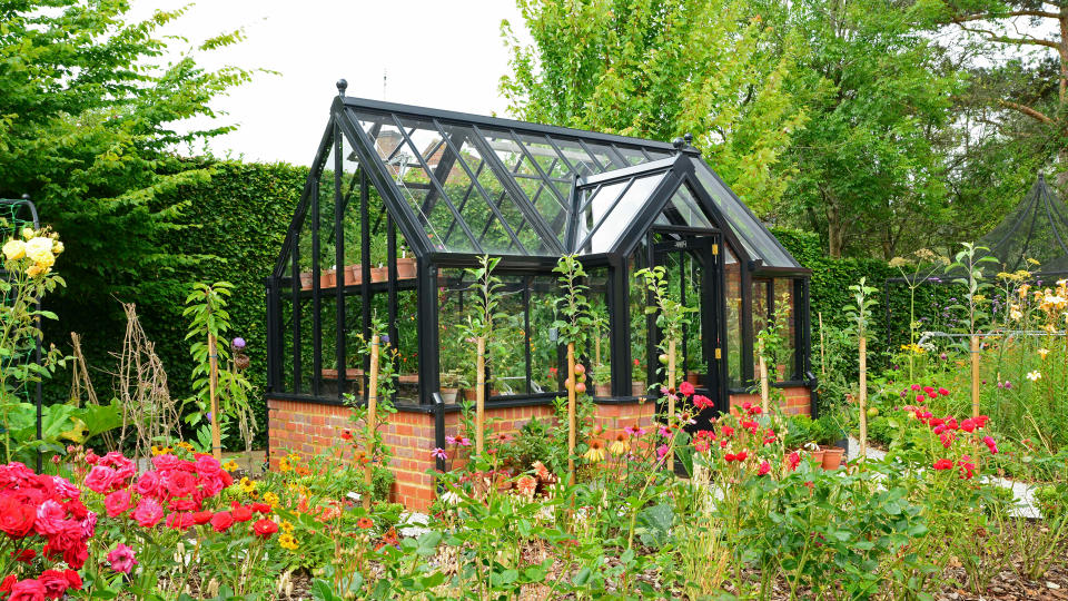 <p> Every traditional cottage garden has an area for growing vegetables. For a true cottage garden feel, try growing produce in amongst the flowers in whatever space you have. You can even grow them in pots. </p> <p> If you&apos;re a keen gardener you might want to consider a greenhouse too. A cottage garden greenhouse provides the perfect opportunity to get a head start on growing your own edibles, now a big post-pandemic trend. &quot;It&apos;s decades since we&apos;ve seen such an interest in growing your own and becoming more self-sufficient,&quot; says Tom Barry, CEO of Hartley Botanic.&#xA0; </p> <p> Adding a greenhouse to your backyard will not only lend itself to cottage garden design ideas but it will also enable you to grow a greater variety of produce, as it lengthens your growing year. </p>