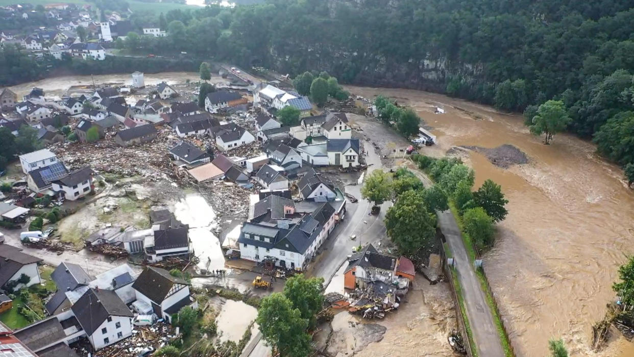 A photo, taken with a drone, shows the devastation caused by the flooding of the Ahr River in the Eifel village of Schuld, western Germany, Thursday, July 15, 2021. At least eight people have died and dozens of people are missing in Germany after heavy flooding turned streams and streets into raging torrents, sweeping away cars and causing some buildings to collapse. (Christoph Reichwein/dpa via AP)