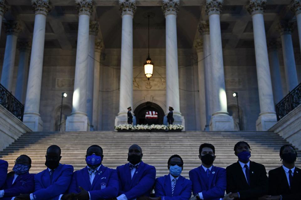 <p>Members of the Phi Beta Sigma fraternity, of which Lewis was a member, linked arms in front of the Congressman's casket. </p>