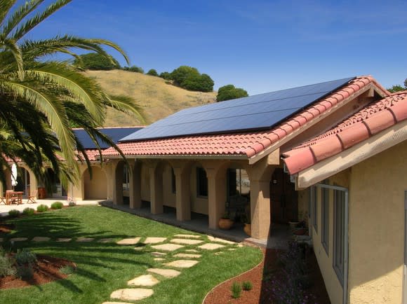 Home with solar panels on the roof.