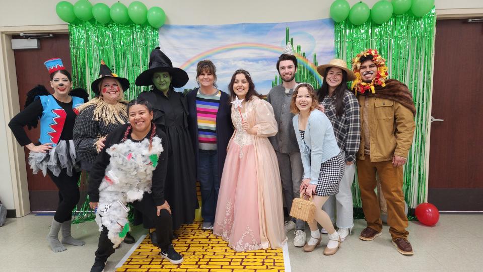 The staff of St. Francis Ministries and volunteers from West Texas A&M University dress up as characters from "The Wizard of Oz" for the  National Adoption Day event, held Nov. 17 at the Randall County Courthouse in Canyon.