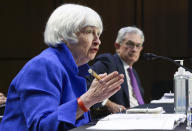 Treasury Secretary Janet Yellen, left, and Federal Reserve Chairman Jerome Powell, appear before a Senate Banking, Housing and Urban Affairs Committee hearing on the CARES Act on Capitol Hill, Tuesday, Sept. 28, 2021 in Washington. (Kevin Dietsch/Pool via AP)