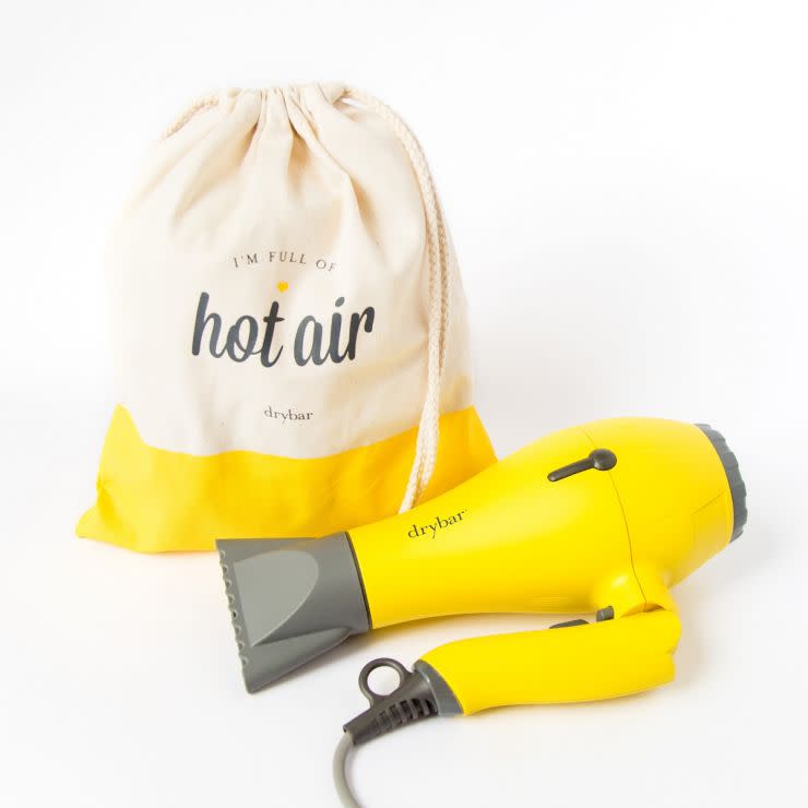 <p><a href="https://www.drybar.com/baby-buttercup-travel-blow-dryer" rel="nofollow noopener" target="_blank" data-ylk="slk:Shop Now;elm:context_link;itc:0;sec:content-canvas" class="link ">Shop Now</a></p><p>Baby Buttercup Travel Blow-Dryer</p><p>$139.00</p><p>drybar.com</p><span class="copyright">drybar.com</span>