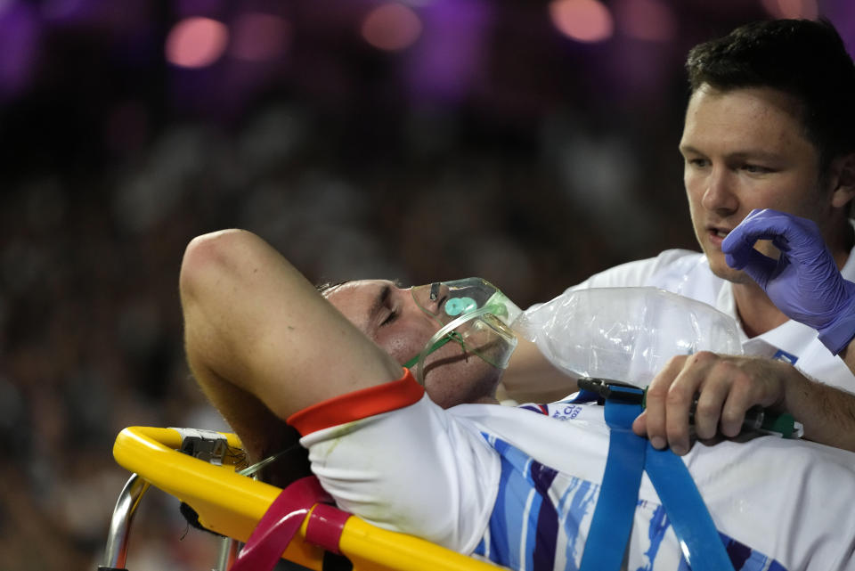 Namibia's Le Roux Malan is taken off the field on a stretcher after getting injured during the Rugby World Cup Pool A match between New Zealand and Namibia at the Stadium de Toulouse in Toulouse, France, Friday, Sept. 15, 2023. (AP Photo/Themba Hadebe)