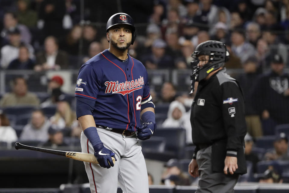 Minnesota Twins designated hitter Nelson Cruz (23) reacts after striking out in the seventh inning of Game 1 of an American League Division Series baseball game against the New York Yankees, Friday, Oct. 4, 2019, in New York. (AP Photo/Frank Franklin II)
