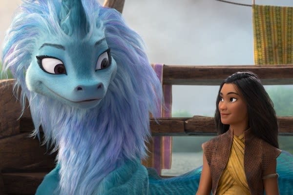 Sisu (voiced by Awkwafina) and Raya (voiced by Kelly Marie Tran) share a knowing look.