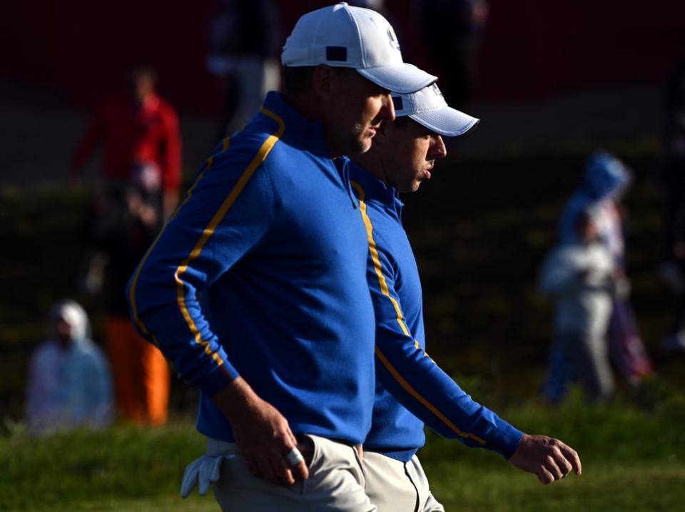 Rory McIlroy (right) and Ian Poulter walk up the first hole during the foursomes on day one of the 43rd Ryder Cup at Whistling Straits (Anthony Behar/PA) (PA Wire)