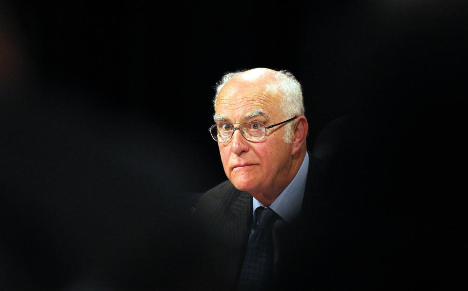 Retired judge Ian Farlamat looks on during a judicial commission of inquiry at the Civic Centre in Rustenburg, South Africa, Monday, Oct. 1, 2012. Farlam, began conducting an official inquiry Monday into the killings of dozens of people near a South African platinum mine, even as labor unrest continued with workers at other mines as well as truck drivers continuing protests over pay. (AP Photo/Themba Hadebe)