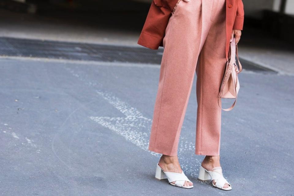 Coral pants with off-white mule shoes