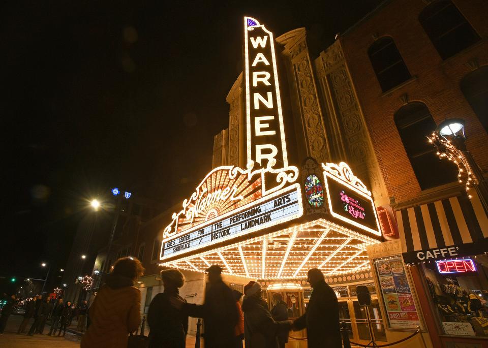 After more than 40 years, the marquee on the front of the Warner Theatre in downtown Erie was re-lit Friday night. The marquee and the vertical "Warner" signs are filled with 6,910 LED lights. The marquee cost $700,000 and is a replica of the original marquee, which was part of the iconic art deco theater, which opened in 1931.