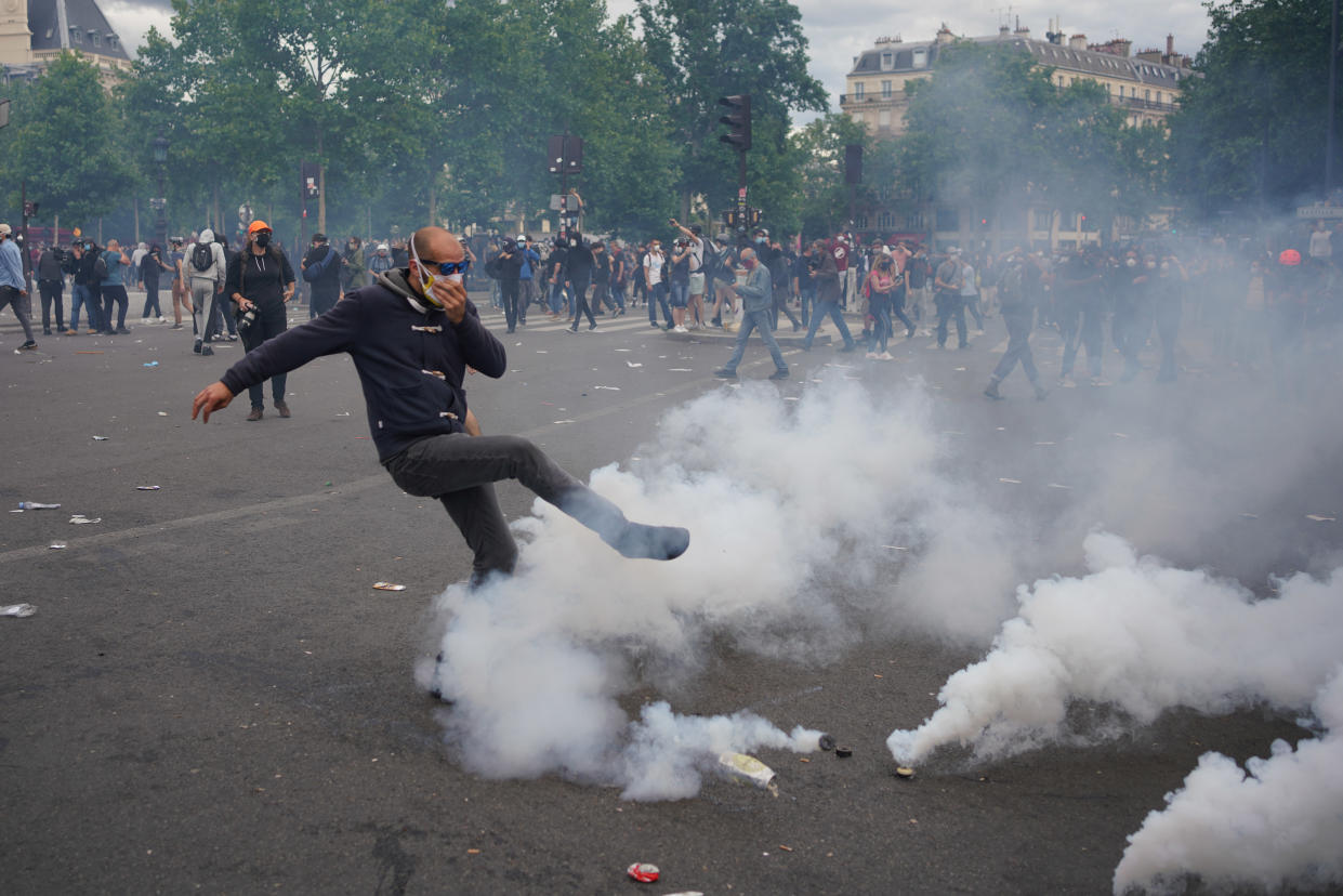 PARIS, FRANCE - JUNE 13, 2020:  Paris riot police fired tear gas to disperse a largely peaceful but unauthorised protest supporting the movement Black Lives Matter protest against brutality and racism near Place de la Republique. Gatherings of more than 10 people are currently banned in France due to coronavirus containment measures.  PHOTOGRAPH BY Abdulmonam Eassa / Barcroft Studios / Future Publishing (Photo credit should read Abdulmonam Eassa/Barcroft Media via Getty Images)