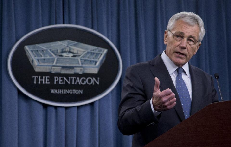 Defense Secretary Chuck Hagel briefs reporters at the Pentagon, Monday, Feb. 24, 2014, where he recommended shrinking the Army to its smallest size since the buildup to U.S. involvement in World War II in an effort to balance postwar defense needs with budget realities. (AP Photo/Carolyn Kaster)