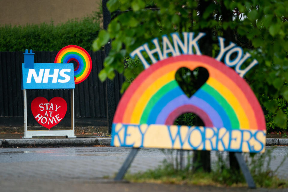 Signs thanking key workers and the NHS are seen in South London as the UK continues in lockdown to help curb the spread of the coronavirus.