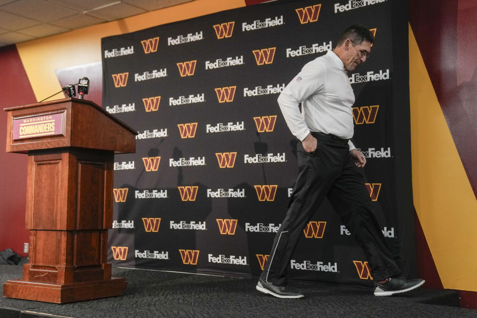 Washington Commanders head coach Ron Rivera walking away from the podium at the end of his news conference following an NFL football game against the Dallas Cowboys, Sunday, Jan. 7, 2024, in Landover, Md. Dallas won 38-10. (AP Photo/Mark Schiefelbein)