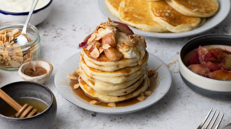 Stack of pancakes with toppings