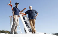 Brett Phaneuf, President of Submergence Group, right, and Don Scott, Chief Technology Officer, MarineAI on board following the launch of the Mayflower Autonomous Ship in Plymouth south west England, Monday, Sept. 14, 2020. The autonomous ship aims to cross the Atlantic from Plymouth, England, to Plymouth, Ma, USA, in April 2021, to become be the first totally autonomous ship to cross the ocean without any help from the outside. (AP Photo/Alastair Grant)