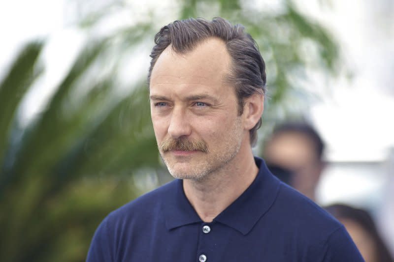 Jude Law arrives at the "Firebrand (Le Jeu De La Reine)" photocall at the 76th annual Cannes film festival at Palais des Festivals on May 22 in France. The actor turns 51 on December 29. File Photo by Rocco Spaziani/UPI