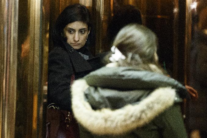 FILE - In this Jan. 10, 2017 file photo, Seema Verma, left, then President-elect Donald Trump's nominee for administrator of the Centers for Medicare and Medicaid Services, gets on an elevator in the lobby of Trump Tower in New York. Verma, the businesswoman selected by President Donald Trump to oversee Medicaid, the health care program for 74 million low-income Americans, has said the program is structurally flawed at its core by policies that burden states and foster dependency in the poor. (AP Photo/Evan Vucci File)