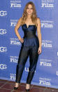 Jumpsuits, love 'em or hate 'em? We've always been on the fence and always will be. That said, we're kinda feeling this Stella McCartney ensemble Jennifer Lawrence recently wore to the 28th Santa Barbara Film Festival. Surprisingly, we also like the lack of accessories. All she needed were those basic black Casadei pumps. (2/2/2013)