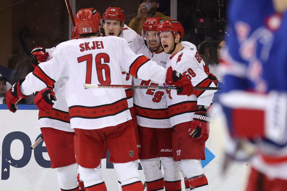 May 7, 2024; New York, New York, USA; Carolina Hurricanes left wing Jake Guentzel (59) celebrates his goal against the New York Rangers with teammates during the second period of game two of the second round of the 2024 Stanley Cup Playoffs at Madison Square Garden. Mandatory Credit: Brad Penner-USA TODAY Sports