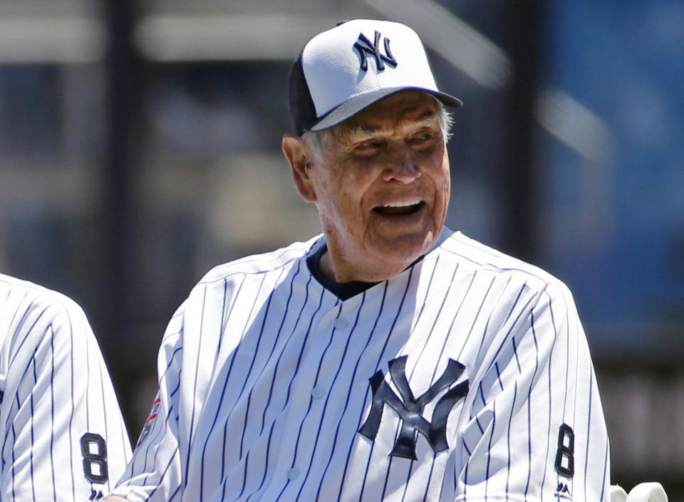 FILE - In this June 12, 2016, file photo, former New York Yankees player Eddie Robinson smiles before the Yankees annual Old Timers Day baseball game, in New York. Former big leaguer and general manager Eddie Robinson, who was the oldest living former MLB player, has died at age 100. The Texas Rangers, the team for which Robinson was GM from 1976-82, said he passed away Monday night, Oct. 4, 2021 at his ranch in Bastrop, Texas.(AP Photo/Kathy Willens, File)