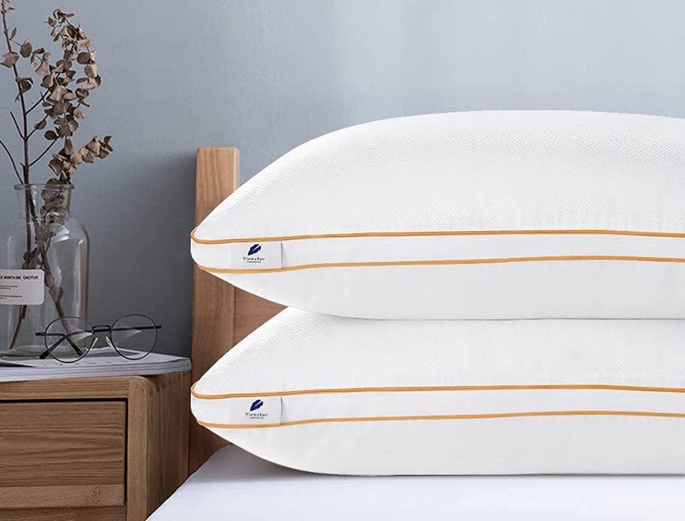 pillows stacked on a bed