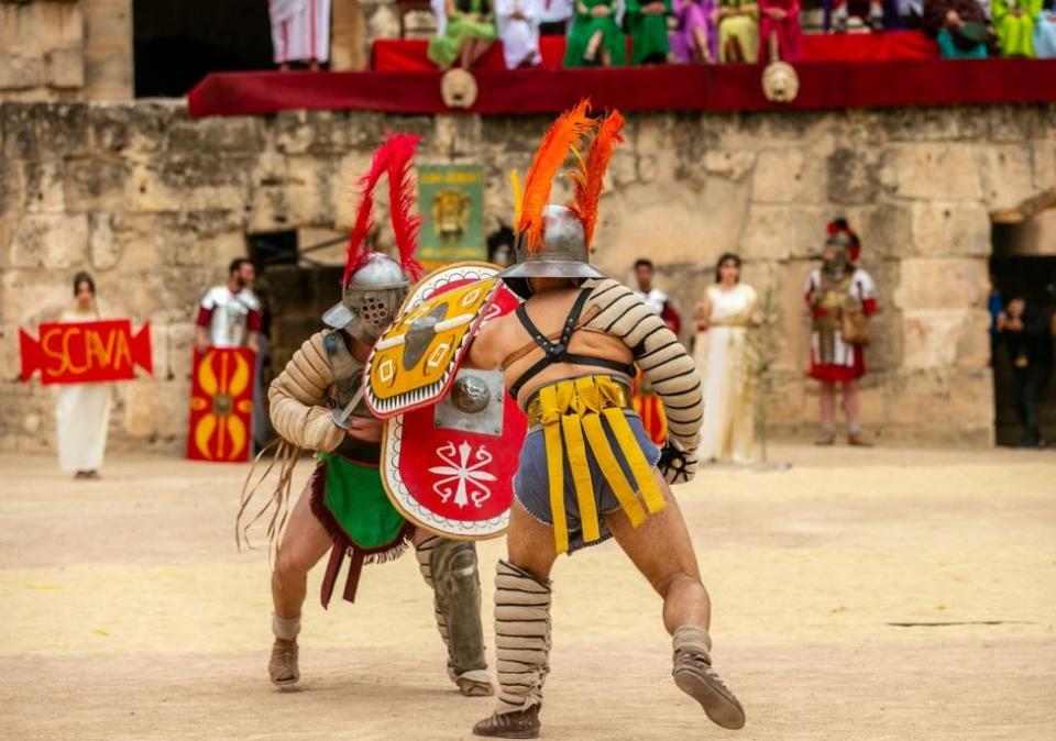 Tunisians gather at El Djem Amphitheater for the 'Thysdrus Rome Days' Festival.