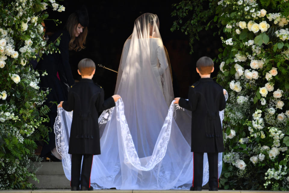 <p>The train on Markle’s dress was about 16 feeet long. (Photo: Getty) </p>