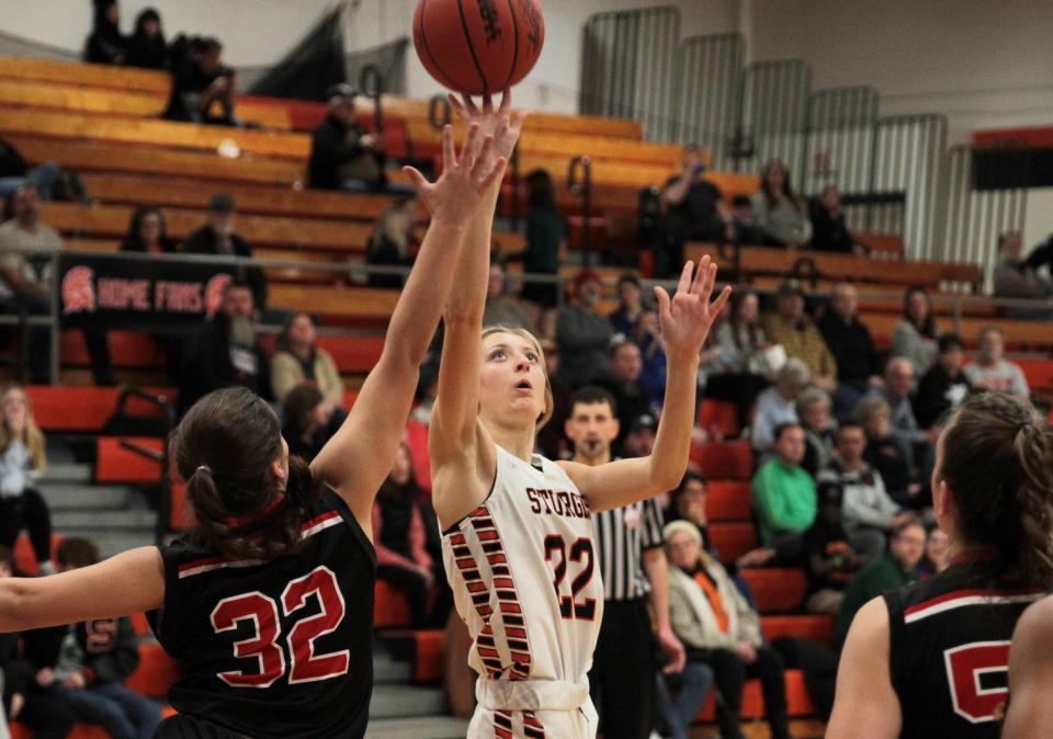 Kylie Brooks scores two points for Sturgis against Vicksburg on Friday.